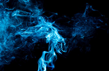 Blue smoke isolated on black background.