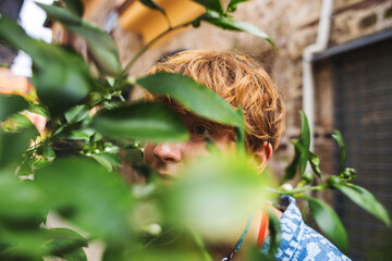 Portrait of a girl sniffing flowers