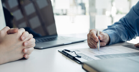 Employer or selection committee is reading the candidate's resume and competence background, Job...