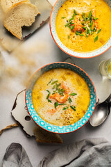 Homemade Finnish salmon soup with creamin bowls, top view