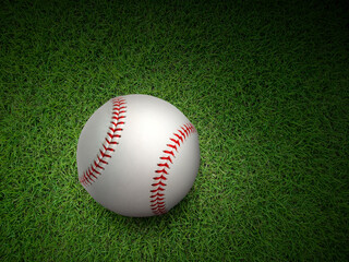 Baseball on the green turf close-up