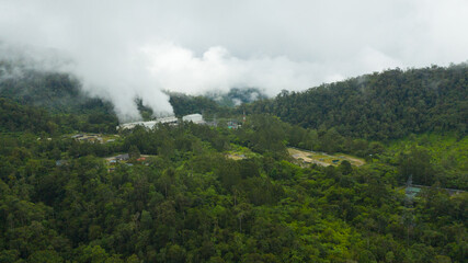 Geotermal power plant on Mount Apo. Steam and pipework at the Geothermal Power Station. Mindanao, Philippines.
