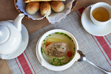 chicken soup with bread and tea