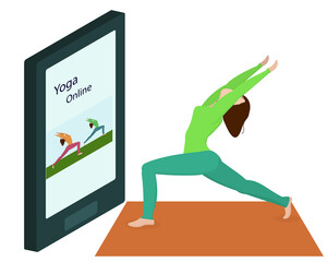 a young woman does yoga online at home. Healthy Lifestyle Concept