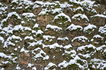 stone wall with snow tops