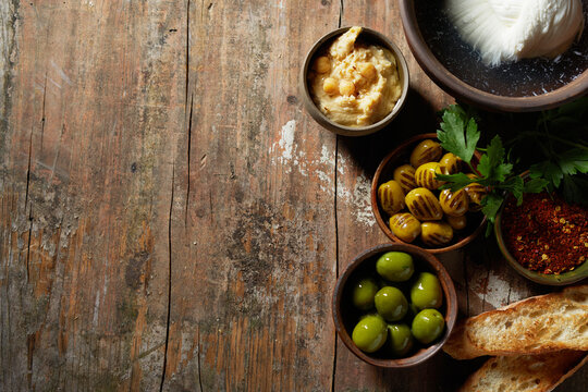 Local Mediterranean breakfast border with green olives