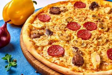 italian juicy pizza assorted with mushrooms, sausage