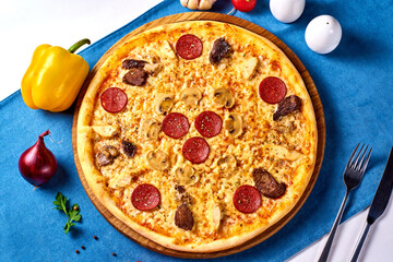 italian juicy pizza assorted with mushrooms, sausage