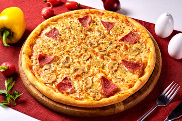 pizza with sausage and mushrooms