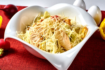 Caesar salad in a white plate