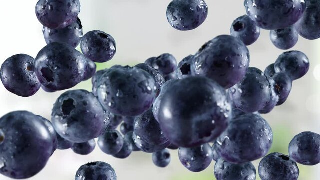 Flying of Blueberries in Kitchen Background