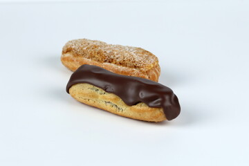 eclairs with chocolate and nuts
