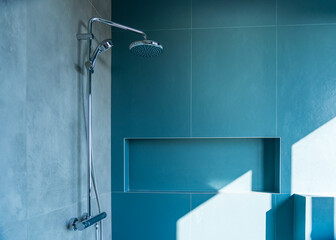 Shower concept made of blue-green porcelain stoneware
