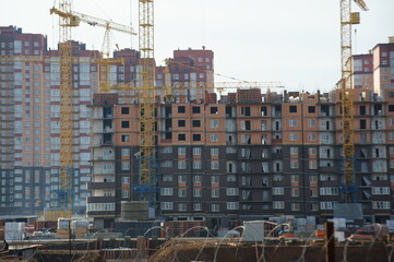 Houses under construction in a residential complex.