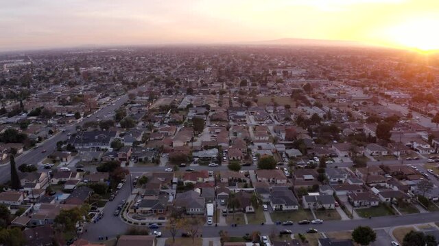 Sunset aerial view of a neighborhood in Downey, California, USA.