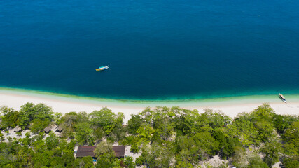 Fototapeta premium Aerial view of Seascape with beautiful beach and tropical Great Santa Cruz island. Zamboanga, Mindanao, Philippines.