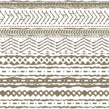Horizontal winter Seamless abstract repeat border pattern. Random rough, twisted part of beige triangles or broken lines, zigzags, circles or big dots shapes. Hand drawn effect on white background.