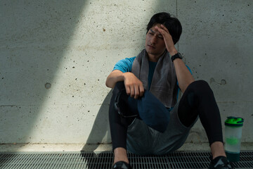 運動中に体調を崩した男性