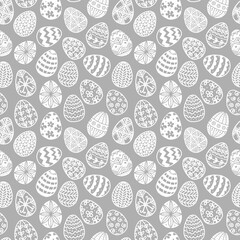 Seamless pattern with doodle easter eggs on grey background. Can be used for wallpaper, pattern fills, textile, web page background, surface textures.