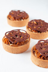 Fresh pastries, cakes from the bakery on a light background