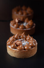 Fresh pastries, cakes from the bakery on a dark background
