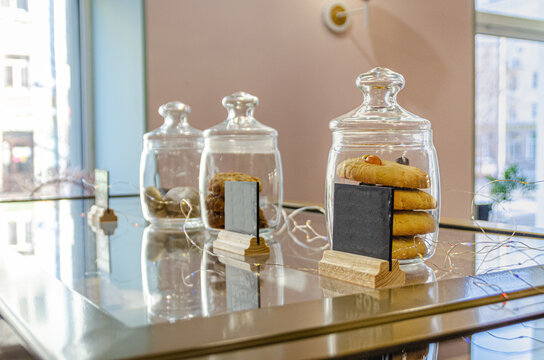 oat biscuits with candied fruit in glass jars. High quality photo