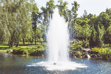 Fountain on the lake in the landscape park Mezhigirya near Kiev, Ukraine.	