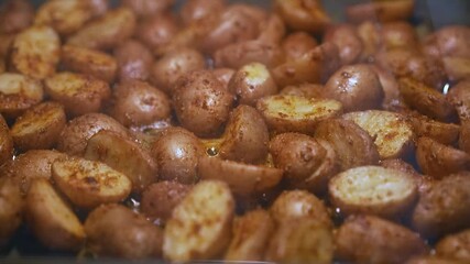 Golden roasted potatoes in oven