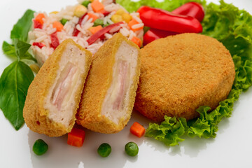 Chicken meatballs in batter with ham and risotto