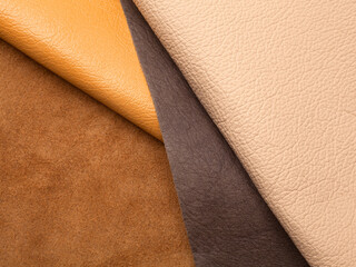 Natural leather textures samples on brown background