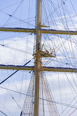 Obraz premium Masts and rigging of a sailing ship against sky