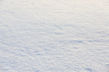 Flat fluffy snowdrift surface at sunny day