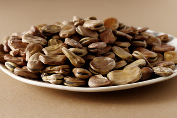 Dried fava beans (Vicia faba) close-up. Vegan protein food.
