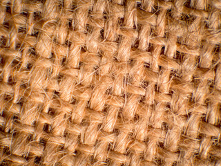 Close-up of hemp, brown fibers with gaps between fibers, high magnification, super macro.
