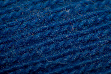 Close-up of synthetic fabric, Blue fiber with gaps, High magnification, Super macro.