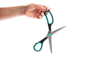 Woman hand with scissors isolated on the white background, banner