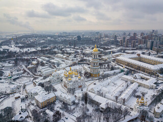 Kiev Pechersk Lavra, covered with snow. Cloudy winter morning. Aerial drone view. © Sergey