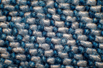 Synthetic fiber photos of denim There is a space between the fibers. Tidy weave, blue-white fibers, high magnification, super macro.