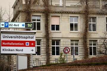 Zurich, Switzerland - 02 06 2021: Signpost of Emergency room or E.R. direction at University Zurich...