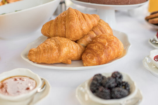 Delicious breakfast with fresh croissants. Delicious continental breakfast with fresh flaky croissants
