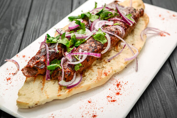 Georgian cuisine - lulia kebab, with grilled onions, traditional Georgian cuisine