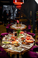 Georgian cuisine. A large laid table of different dishes