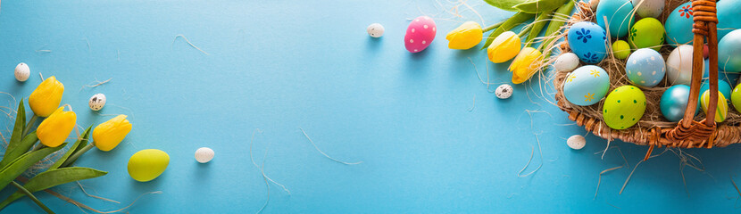 Easter Eggs And Flowers On A Blue Background