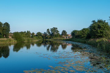 Beautiful landscape of Suzdal with a view from the high bank of the Kamenka River with a bend in...