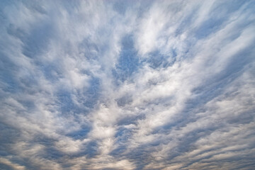 Dark storm clouds before rain at sunset time.