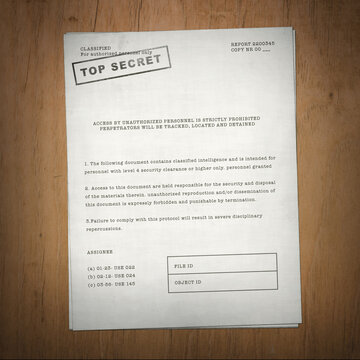 top secret classified document on wooden desk background