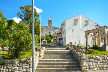 A long staircase with many steps passes a cemetery leading to a medieval church in the old town of Mostar, Bosnia and Herzegovina