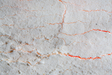 Obraz premium abstraction fire through the snow, cracks in the snow, flour