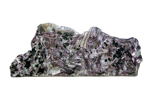 Huge crude charoite stone on white background 