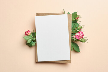 Greeting card with fresh roses flowers on paper background